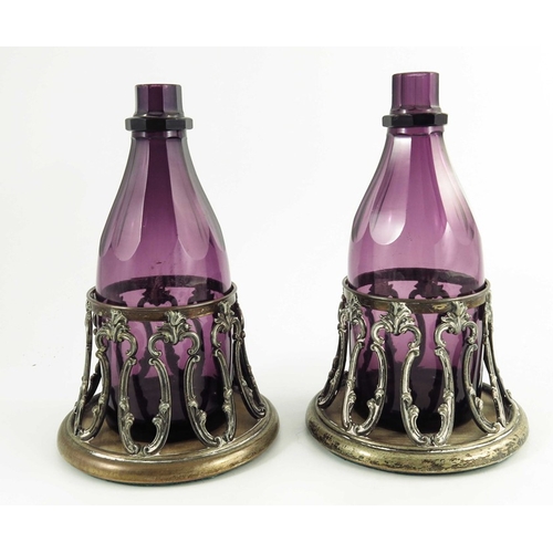 9 - A pair of William IV amethyst glass decanters in original Old Sheffield Plate coasters, circa 1835, ... 