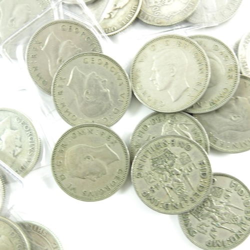 202 - A group of shillings, including Victoria, Edward VII, George V, George VI and Elizabeth II (29)