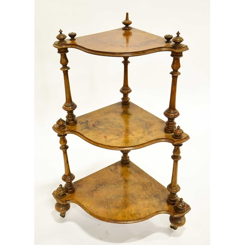 228 - A Victorian figured walnut three tier corner whatnot, serpentine edged graduated shelves supported o... 