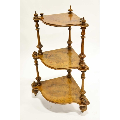 228 - A Victorian figured walnut three tier corner whatnot, serpentine edged graduated shelves supported o... 