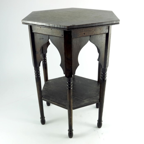 254 - Liberty and Co., an Arts and Crafts oak Moorish occasional table, hexagonal top, on turned legs unit... 