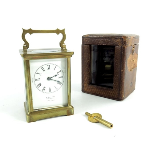 258 - A Brass Encased French Carriage Clock, marked 'Jack & Co, Cheltenham' Made in France to the dial, wi... 