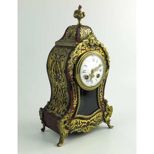 266 - A 19th century French Boulle work and ormolu mounted clock, bombe form, the 3.5 inch white enamelled... 