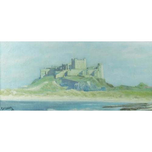 349 - John Davison Liddell (1859-1942), Bamburgh Castle, oil on board, signed and dated 1924, 17cm x 38cm,... 