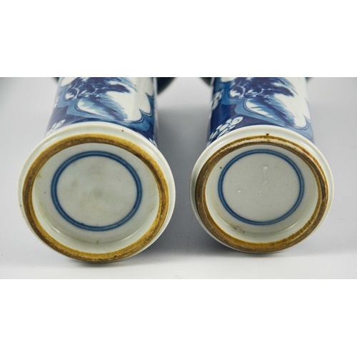 383 - A pair of Chinese blue and white sleeve vases, flared trumpet form, prunus grounds with lobed navett... 