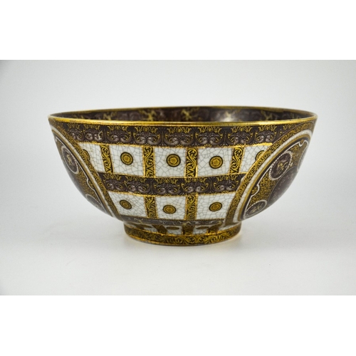 389 - A Large Crackle Glazed Bowl decorated in brown and gilt enamels on a grey ground, the banding and ci... 