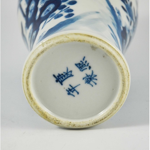 393 - A Chinese Kangxi blue and white vase, inverse baluster form, painted with women in a garden landscap... 