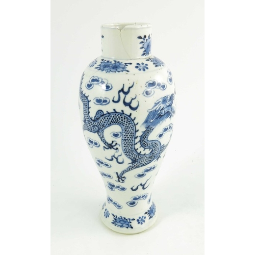 406 - A Chinese blue and white vase, Kangxi mark, baluster form, painted with two four-clawed dragons amid... 