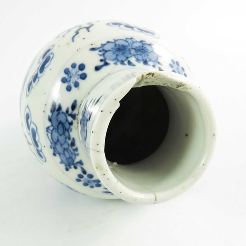 406 - A Chinese blue and white vase, Kangxi mark, baluster form, painted with two four-clawed dragons amid... 