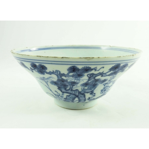 411 - A Chinese blue and white bowl, Ming, ogee form, painted with prunus, 18cm diameter