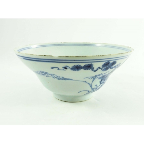 411 - A Chinese blue and white bowl, Ming, ogee form, painted with prunus, 18cm diameter