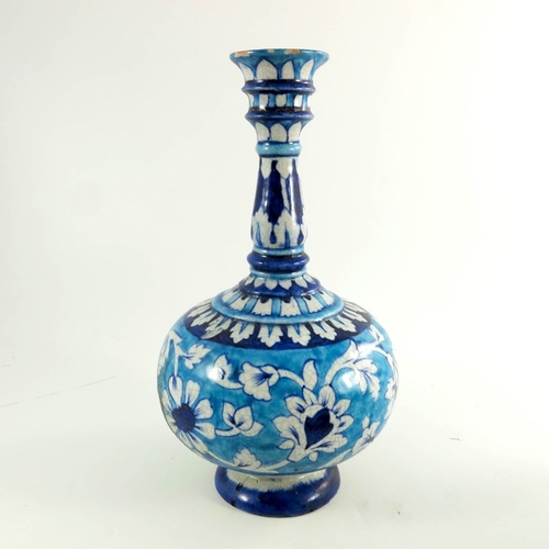 421 - A large Iznik globe and shaft vase, together with a Moroccan faience pomegranate bowl, circa 1860, 3... 