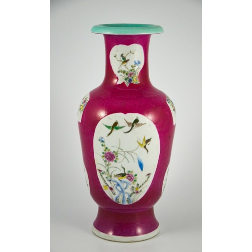 427 - A Chinese Famille Rose Decorated Porcelain Vase, the red ground with turquoise rim, bearing Ching Ku... 