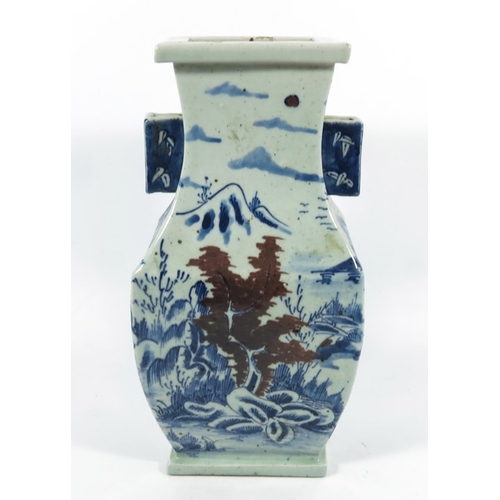 430a - A Chinese blue and white vase, square section baluster form with wing handles, 33cm high