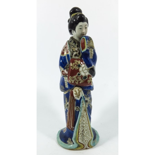 430c - A Japanese Imari figure, modelled as a Geisha, the top section removing to reveal an unclothed lower... 