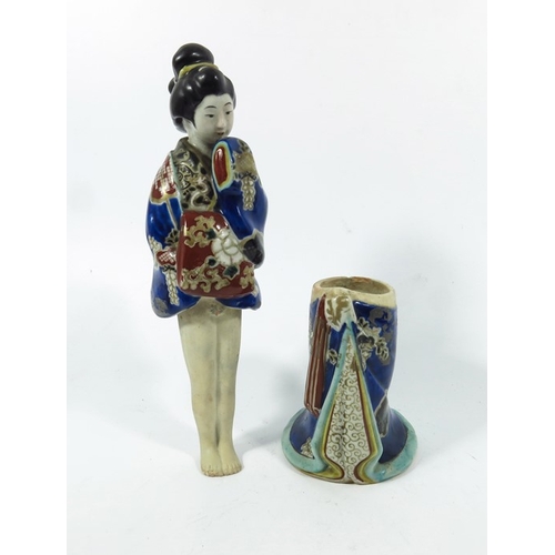 430c - A Japanese Imari figure, modelled as a Geisha, the top section removing to reveal an unclothed lower... 