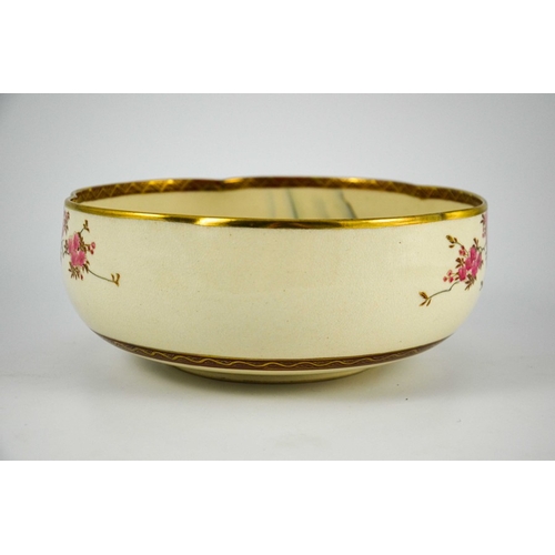 434 - A Japanese Satsuma bowl, Meiji, lobed form, painted to the interior with a watery landscape with pru... 