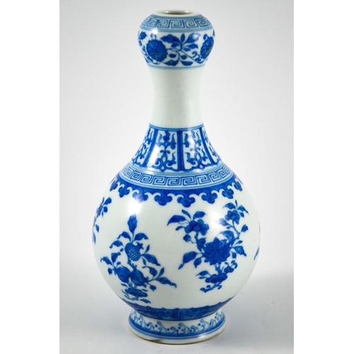 436 - A Chinese blue and white garlic head bottle vase, Qianlong mark, double gourd form, painted in the T... 