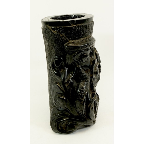 452 - A large Chinese lignite or black lacquer resin brush pot, carved with a wrythen dragon to one side, ... 