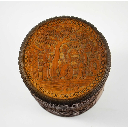 454 - A Chinese bamboo lidded brush pot, carved and blind reticulated with alternating phoenix birds and l... 