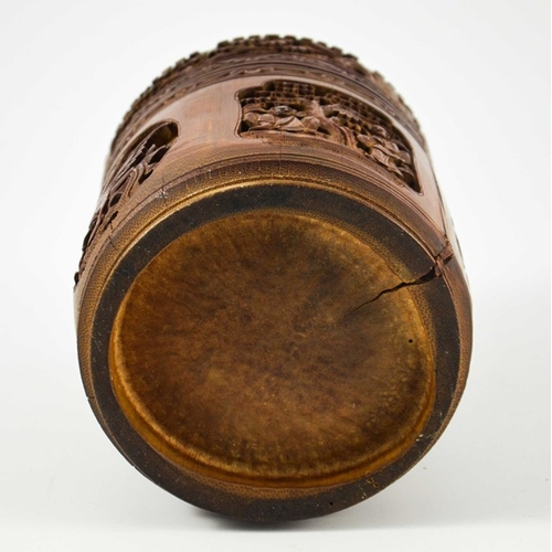 454 - A Chinese bamboo lidded brush pot, carved and blind reticulated with alternating phoenix birds and l... 