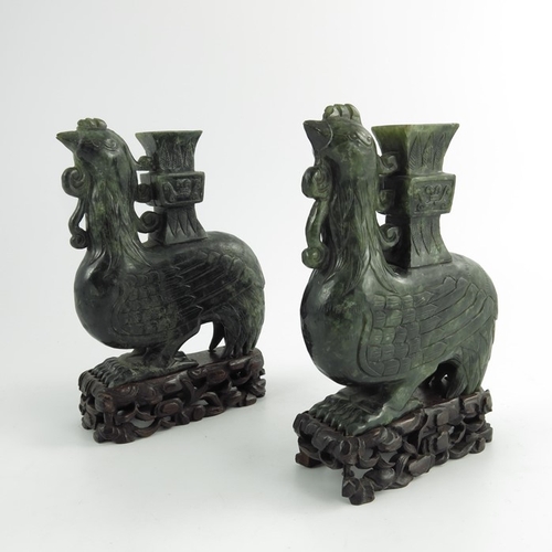 455 - A Pair of Chinese Spinach Green Jade Carved Bird Vases, cirac20th century, the carved stylised phoen... 