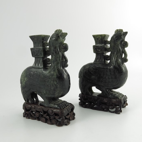 455 - A Pair of Chinese Spinach Green Jade Carved Bird Vases, cirac20th century, the carved stylised phoen... 