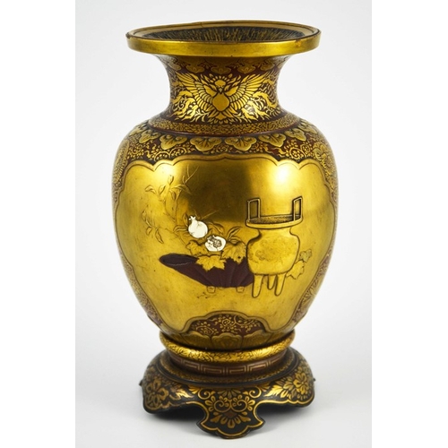 456 - A Japanese Shibayama gold lacquered vase, Meiji, shouldered form on integrated ogee bracket base, de... 