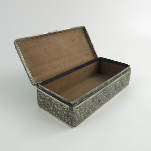 470 - A Chinese Export Silver Cigarette Box, circa 20th century, the rectangular box with repouse bamboo d... 