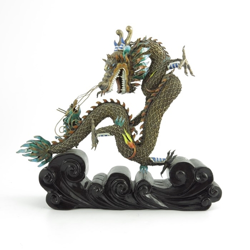 479 - A Silver-Gilt Filigree and Enamel Dragon, Chinese, early 20th century, modelled as a writhing dragon... 