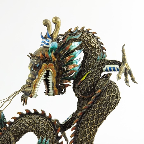 479 - A Silver-Gilt Filigree and Enamel Dragon, Chinese, early 20th century, modelled as a writhing dragon... 