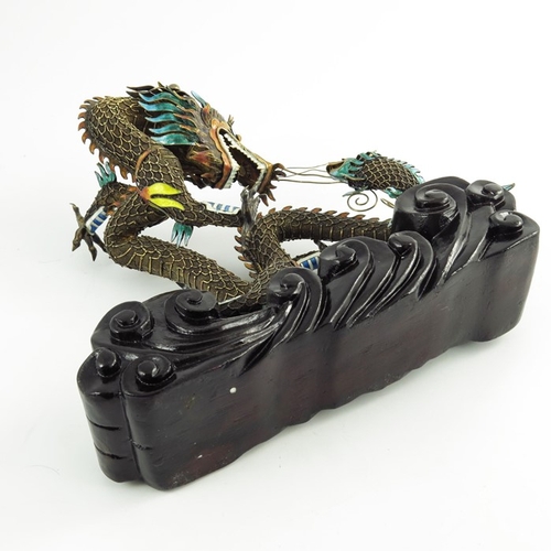 479 - A Silver-Gilt Filigree and Enamel Dragon, Chinese, early 20th century, modelled as a writhing dragon... 