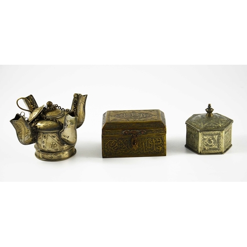 486 - Three Persian metal vessels, including two boxes, engraved with Islamic and Arabic script and foliat... 