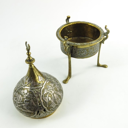 487 - A 19th century or earlier Persian cairoware brass and silver overlay incense burner and cover, the c... 