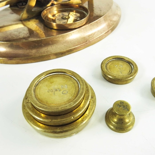 522 - A set of Victorian gilt brass and champlevé enamelled postage scales, each plate with blue knotted f... 