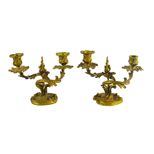 524 - A pair of 19th century French ormolu candelabra, twin branch, Rococo foliate scroll casting with cen... 