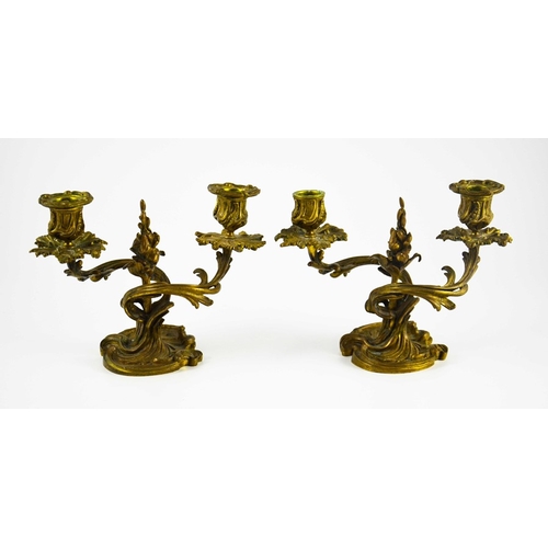 524 - A pair of 19th century French ormolu candelabra, twin branch, Rococo foliate scroll casting with cen... 