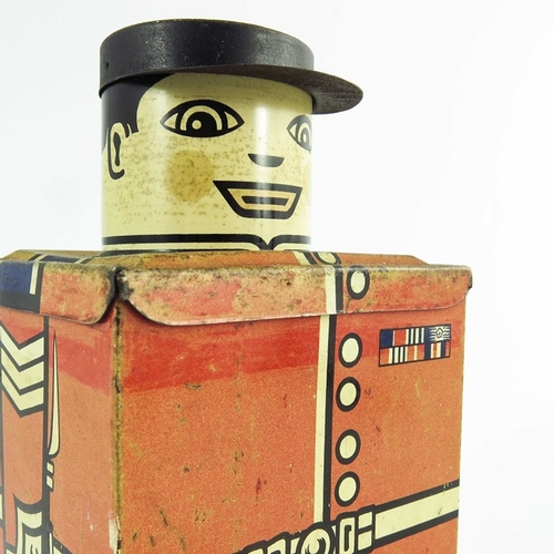 536 - Huntley and Palmers, a Guardsman biscuit tin, circa 1956, cuboid form, modelled as a soldier, 21.5cm... 