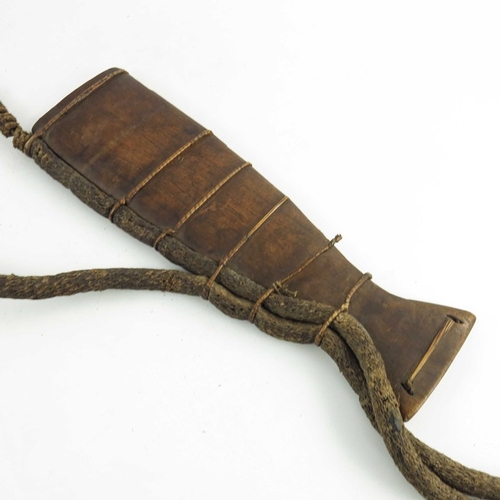 540 - A Congolese ritual knife, Luba or Baluba, leaf-shaped blade and wooden hilt in a two piece wooden sc... 