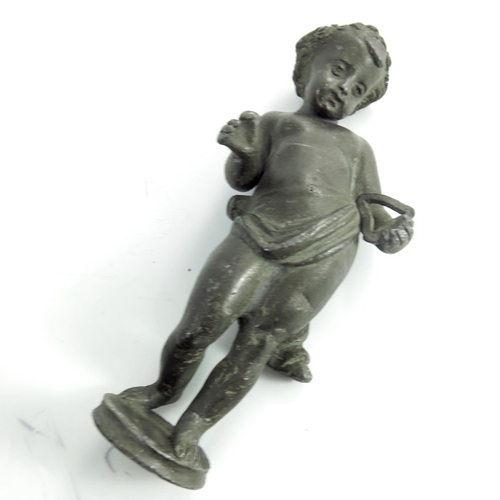 541 - A 19th century lead figural tazza, modelled as a putto holding a conch shell above his head, togther... 