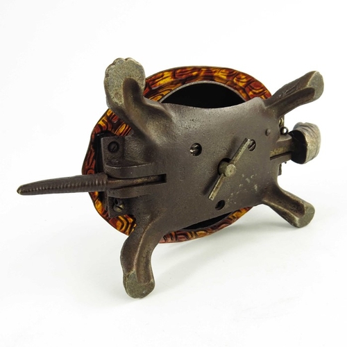 547 - A Victorian Cast iron mechanical table bell modelled as a tortoise, the tortoiseshell back mounted o... 