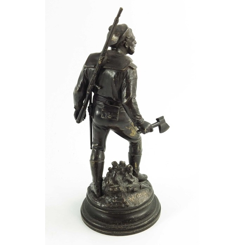 567 - Emile Guillemin, a pair of 19th century French bronze figures, dated 1871, modelled as pioneers, hol... 