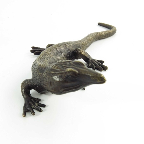 573 - Max Le Verrier, a bronze sculpture of a lizard, circa 1925, signed Le Verrier, 25cm long.