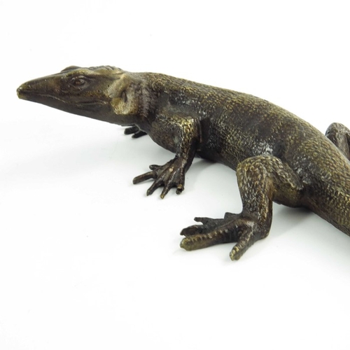 573 - Max Le Verrier, a bronze sculpture of a lizard, circa 1925, signed Le Verrier, 25cm long.