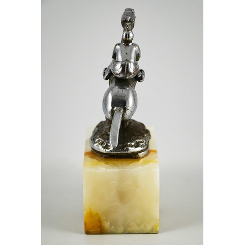 575 - Desmo, an Art Deco chrome plated jockey car mascot, modelled riding a horse, on onyx plinth, the rid... 