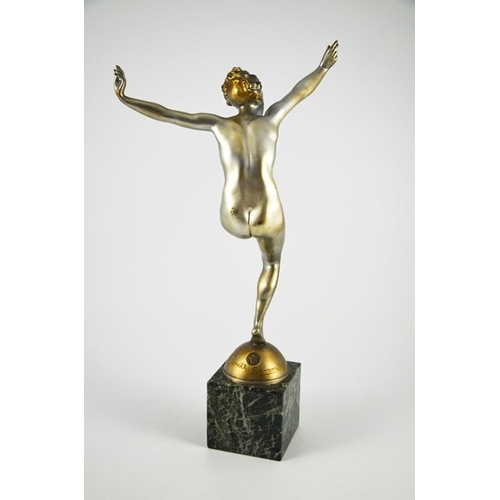 577 - Leonildo Giannoni, an Art Deco silvered and patinated bronze figure of a nude woman dancing, circa 1... 