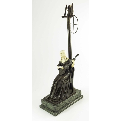 590 - A Continental Bronze and Ivory Figurative Lamp circa 1900, modelled as a seated lady playing a guita... 