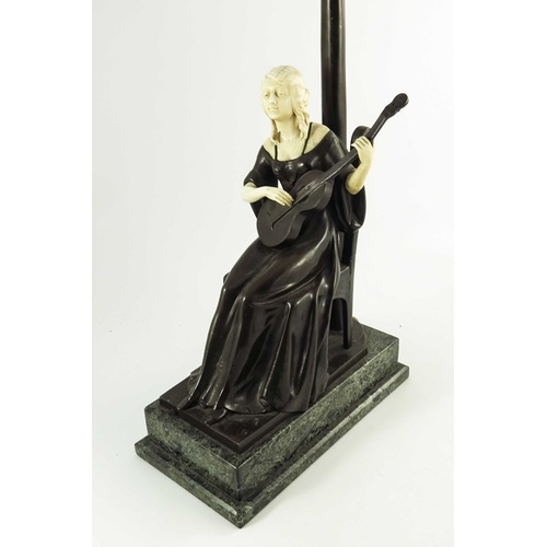 590 - A Continental Bronze and Ivory Figurative Lamp circa 1900, modelled as a seated lady playing a guita... 