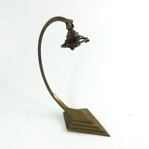 592 - An Art Deco brass table lamp, stepped diamond foot and square section looped arm support