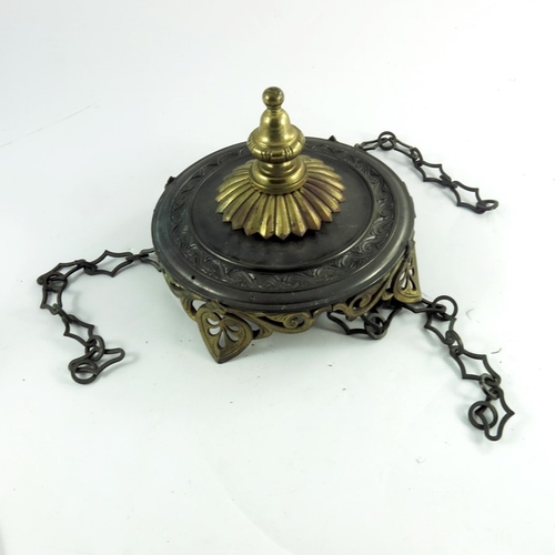 594 - A Victorian gilt metal pendant lantern, circa 1860, reticulated honeysuckle foliate gallery suspende... 